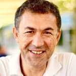 ERCAN KAHRAMAN investor activity on AXP